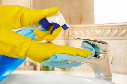 Careful cleaning of a fabric sofa in a Belgravia home