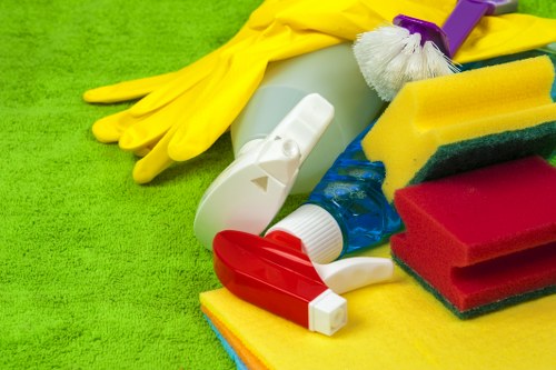 Technician treating stains during upholstery cleaning in Belgravia