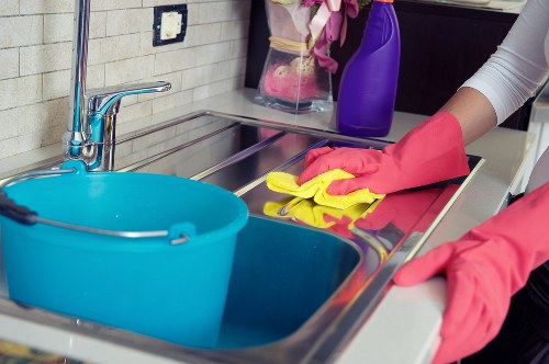 Shiny oven door and polished appliance after professional cleaning